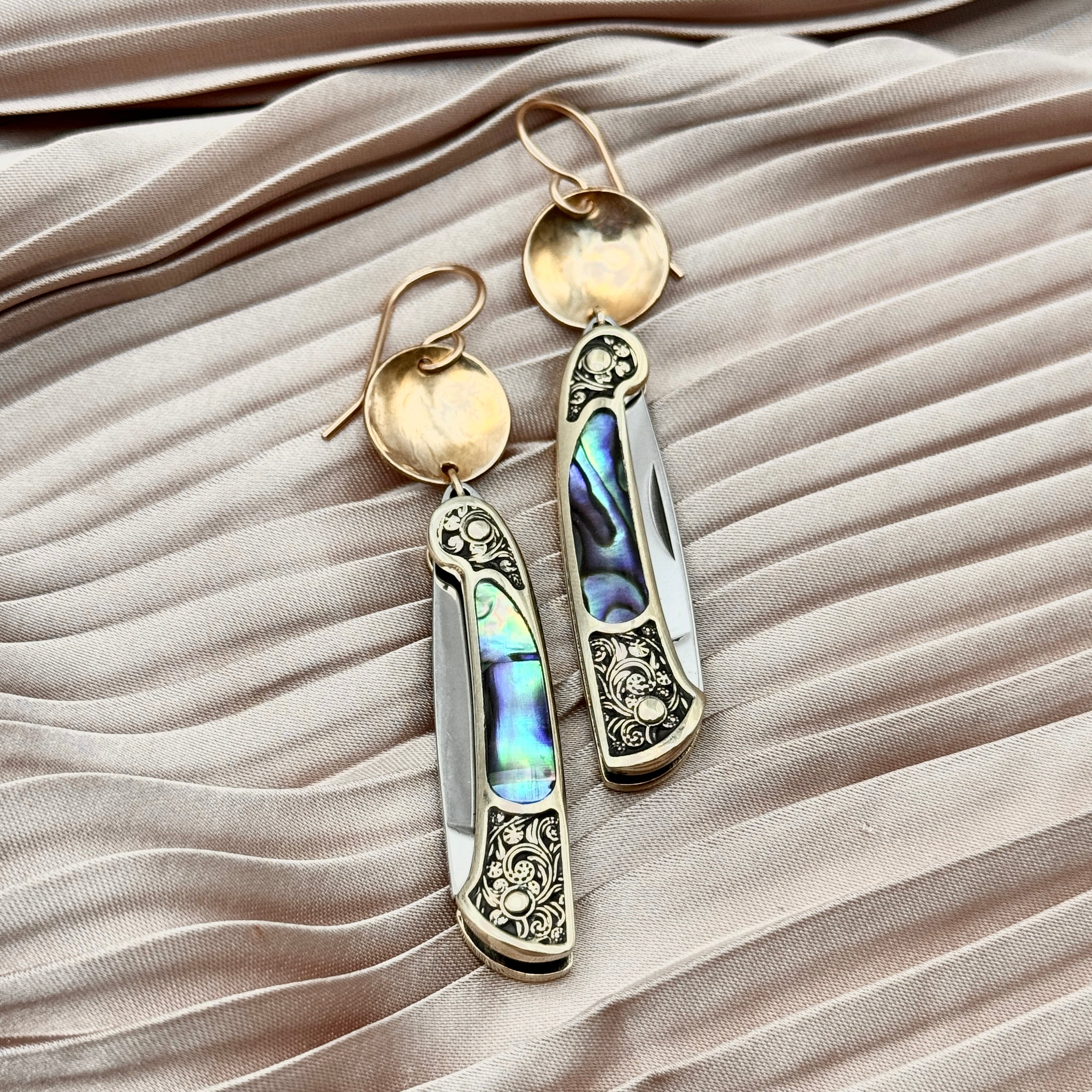 Abalone inlay and vintage inspired etched gold handle on a working pocketknife hanging from an ear wire