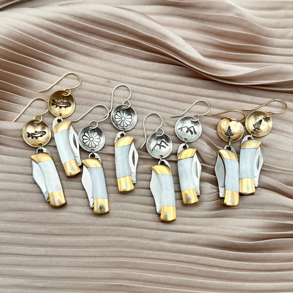 Mini pocket knife with mother of pearl inlay hanging from stamped fish flower mountain or tree circle pendant