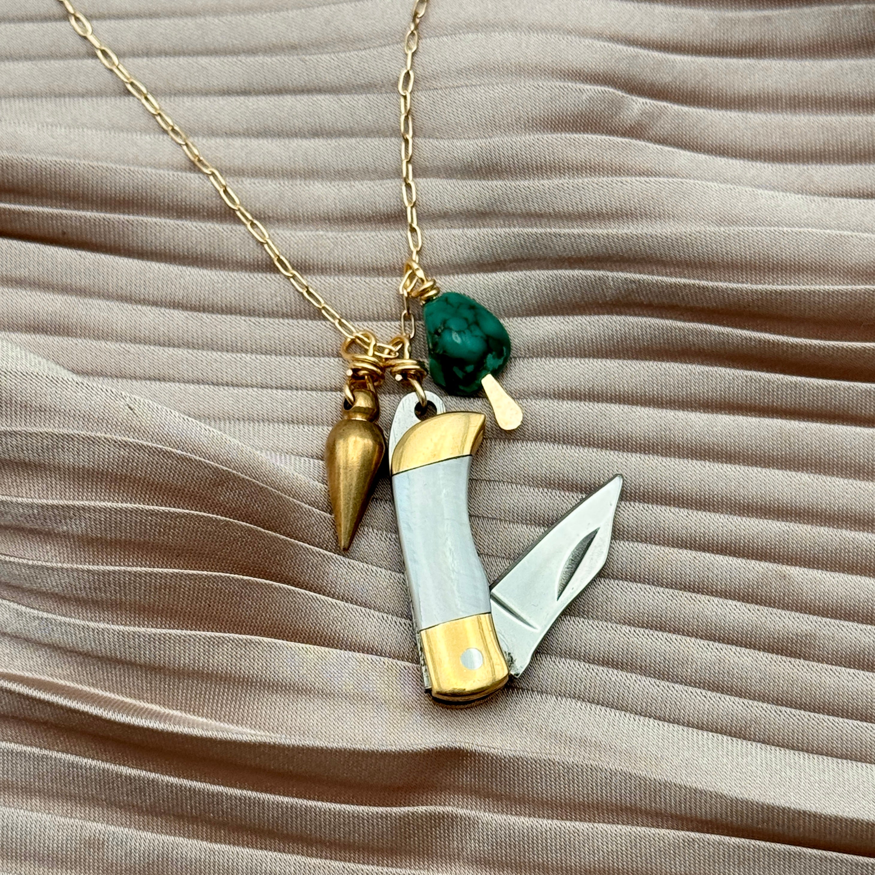 Miniature Pocketknife with mother of pearl inlay and a turquoise stone and mini bullet hanging from sterling silver or gold chain