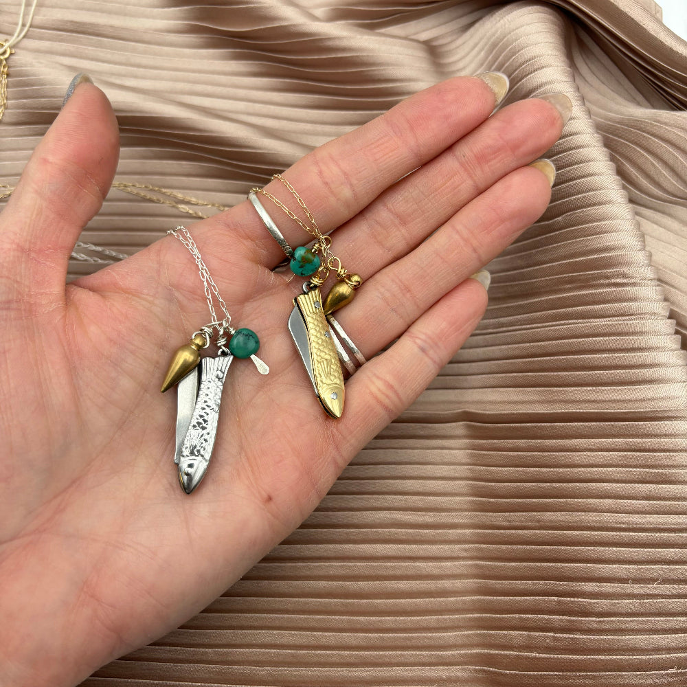 Fish shaped gold or silver mini working pocketknife pendant with brass mini bullet and turquoise bead hanging from gold filled or sterling silver chain