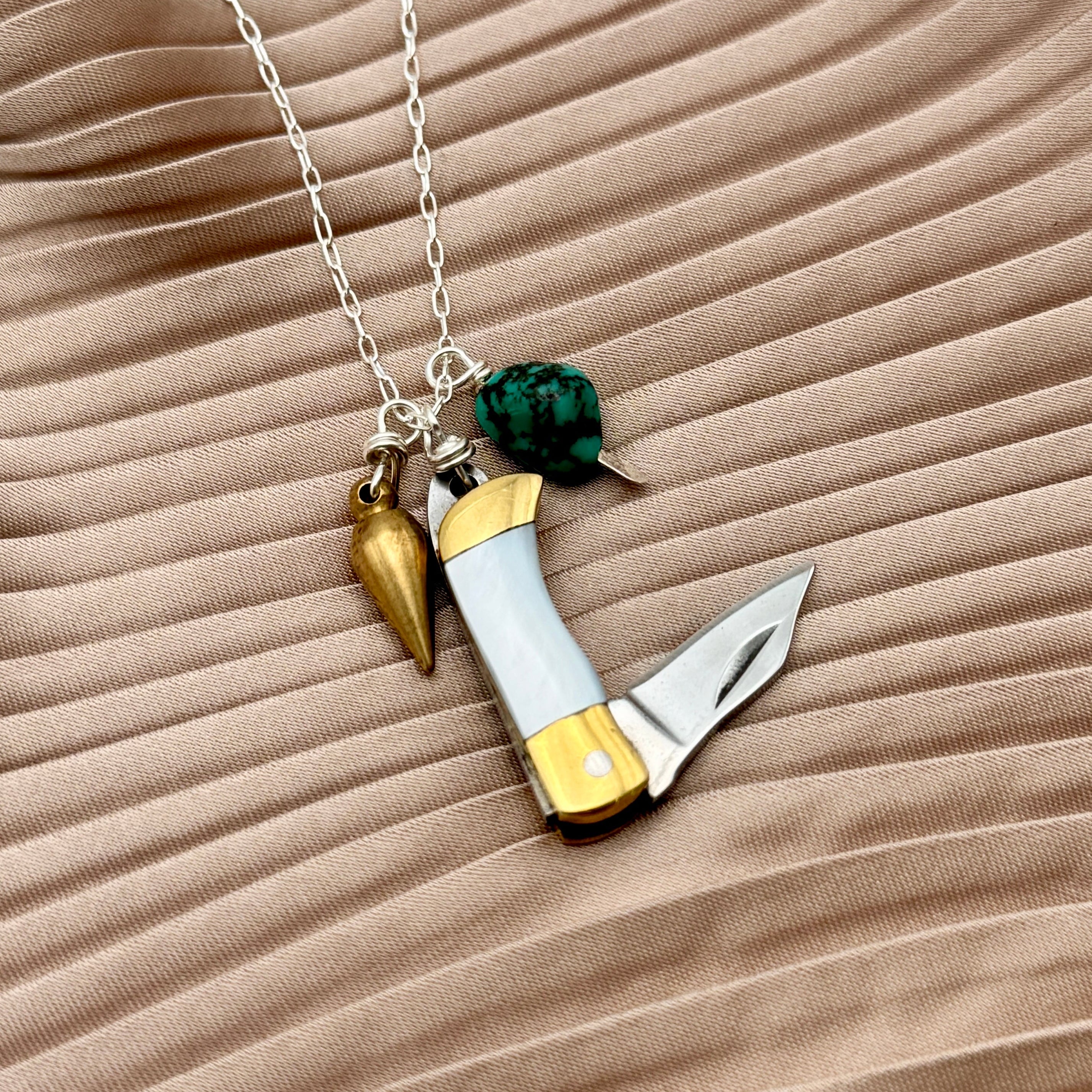 Miniature Pocketknife with mother of pearl inlay and a turquoise stone and mini bullet hanging from sterling silver or gold chain