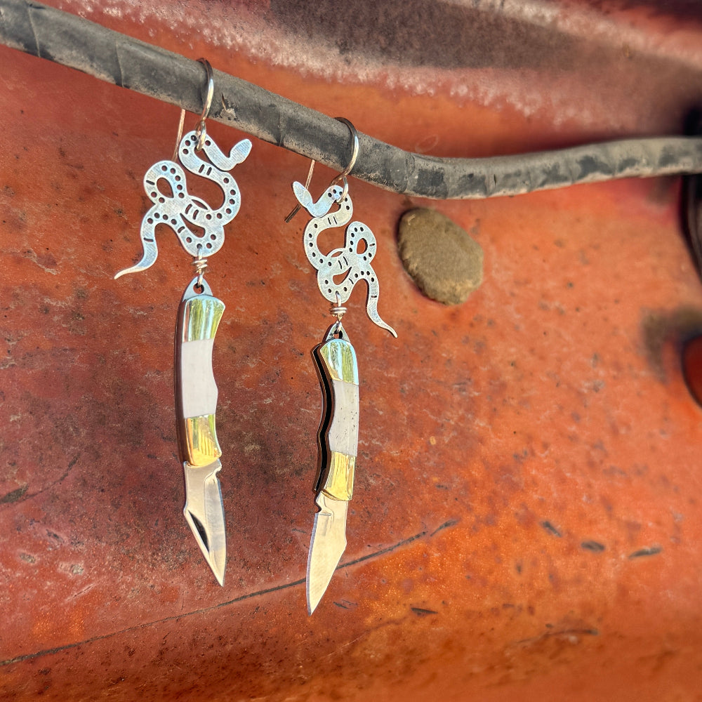 silver snake pendant with bone inlay mini pocketknife hanging from sterling silver ear wire