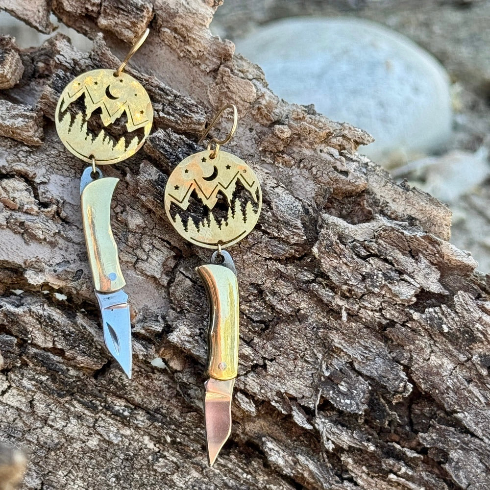Mountain Night Moon Pine tree pendant hanging from ear wire with miniature billie gold or silver pocketknives
