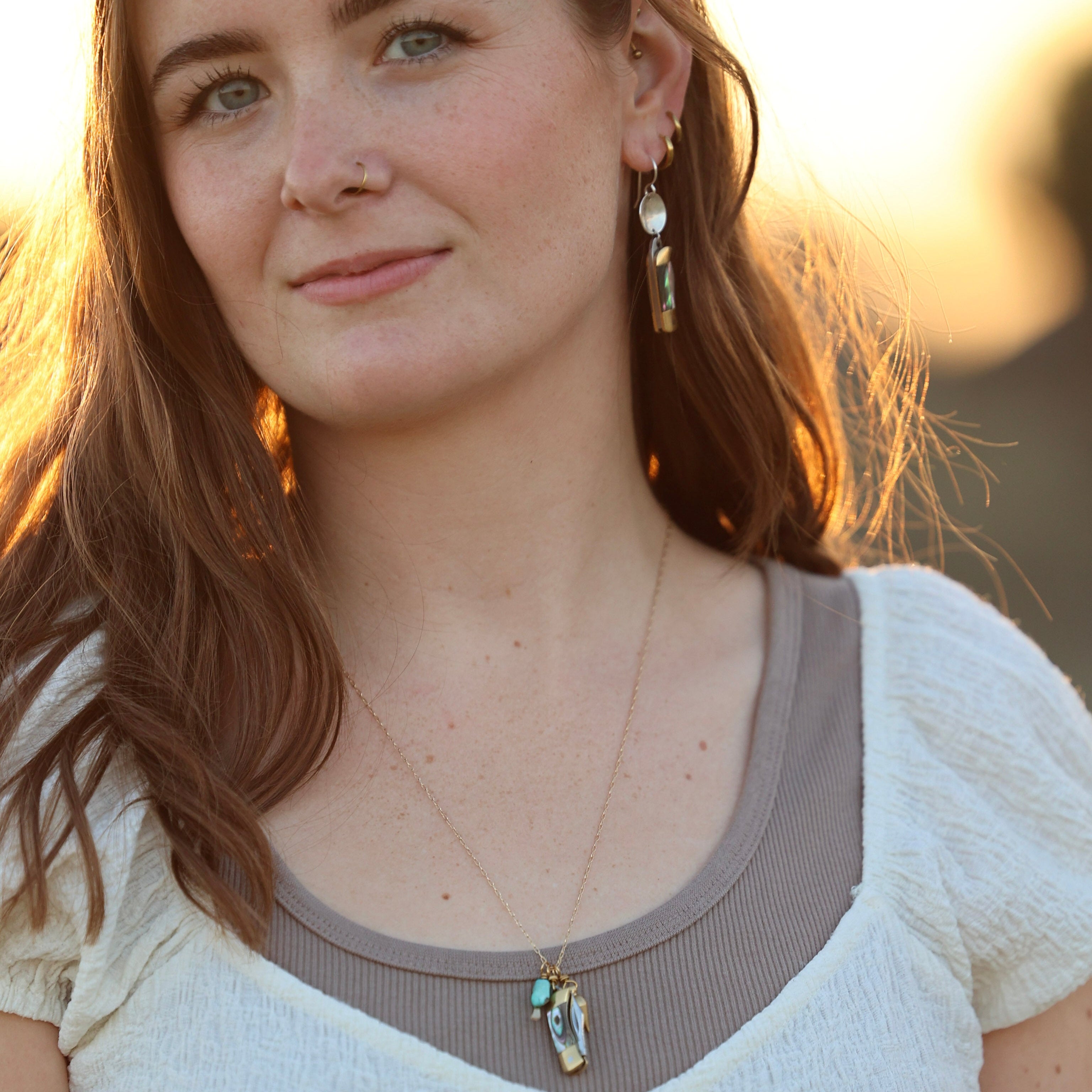 working pocketknife billie earrings with circle and billie jr necklace