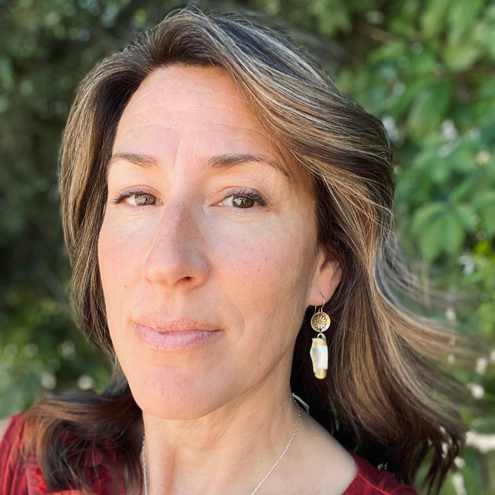 Mini pocket knife with mother of pearl inlay hanging from stamped fish flower mountain or tree circle pendant