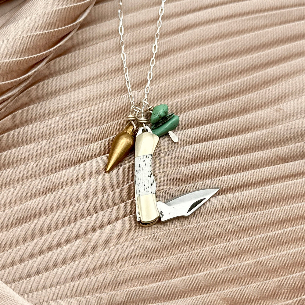 miniature pocket knife necklace with bullet charm and turquoise bead chips on silver chain