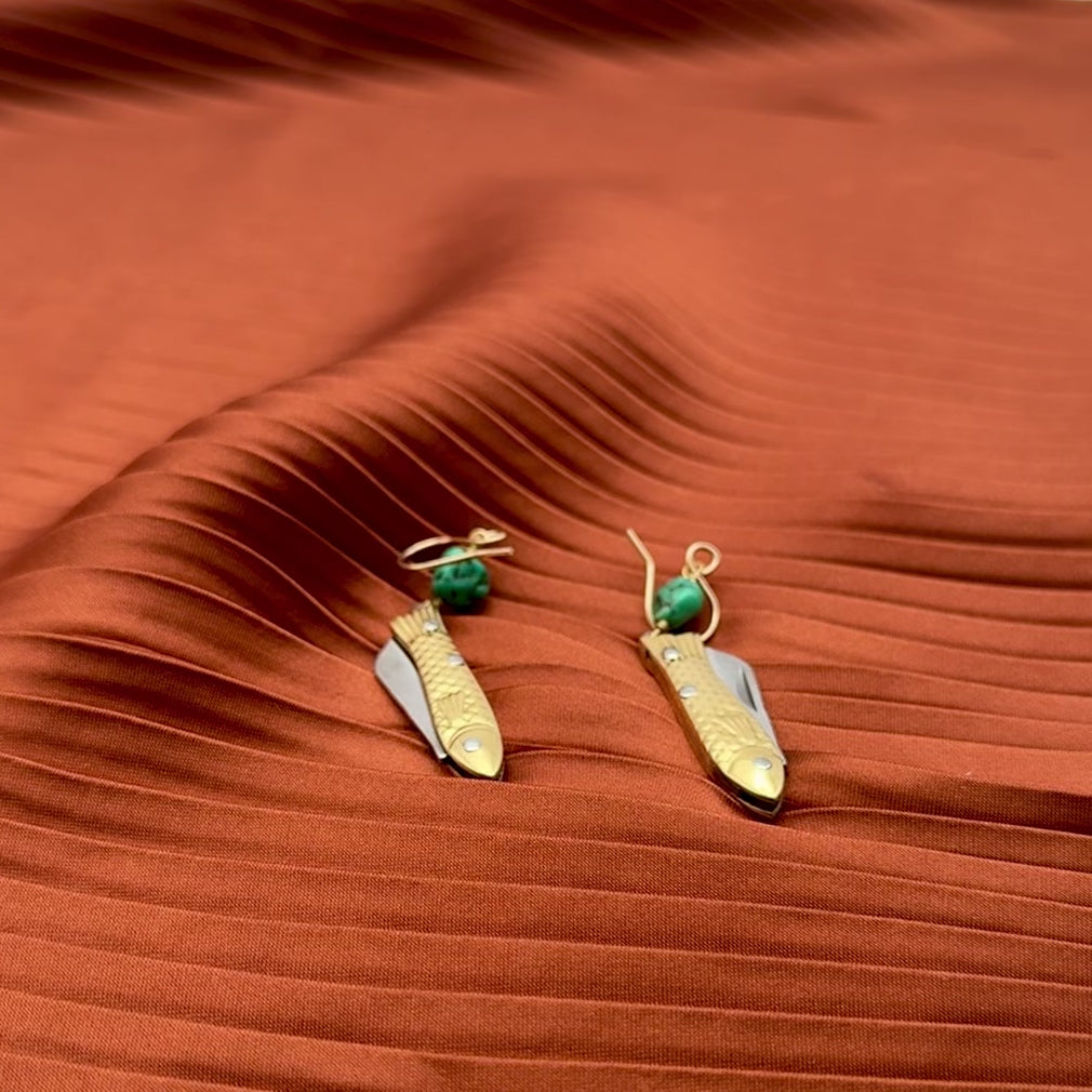 A pair of earrings featuring gold or silver miniature fish shaped utility working pocket knife with or without turquoise nuggets on a sterling silver or 14 karat gold fill ear wire