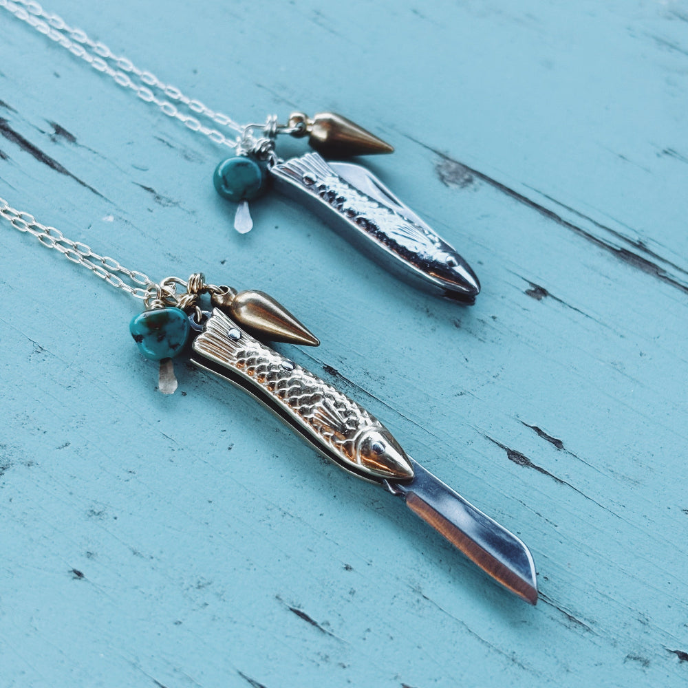 Fish shaped gold or silver mini working pocketknife pendant with brass mini bullet and turquoise bead hanging from gold filled or sterling silver chain 