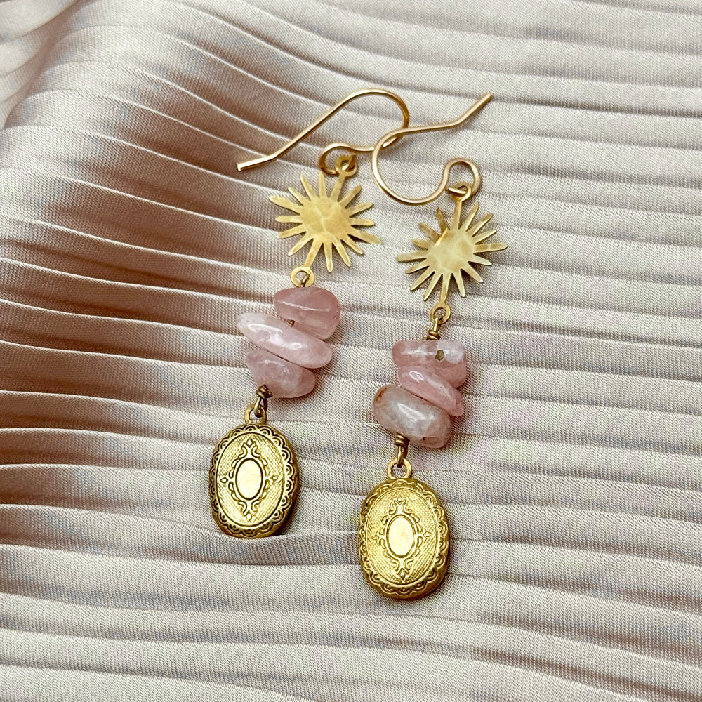 Starburst pendant over three rose quartz beads over a mini vintage inspired etched working locket on an ear wire
