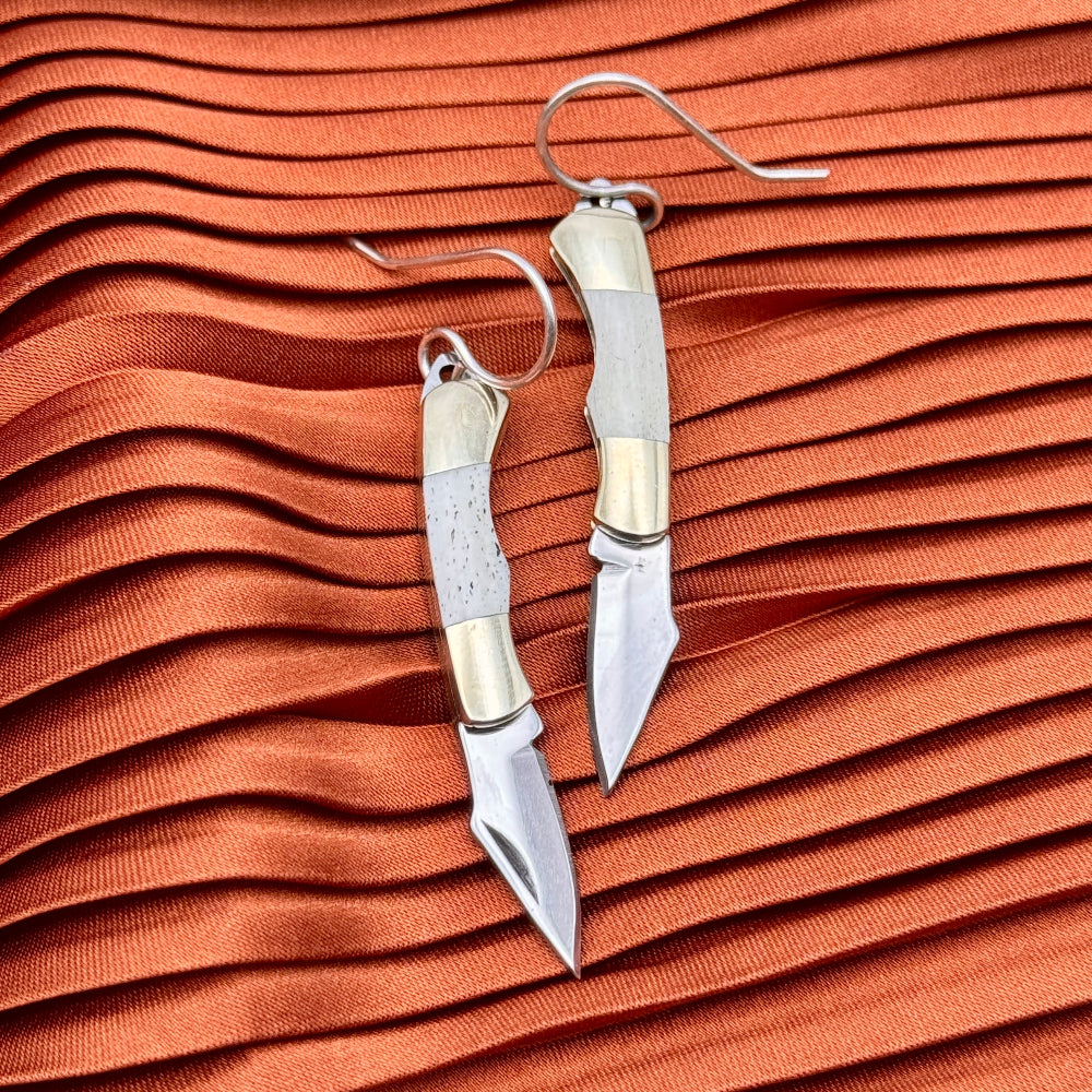Two miniature bone inlay pocketknives hanging from gold or sterling silver ear wires
