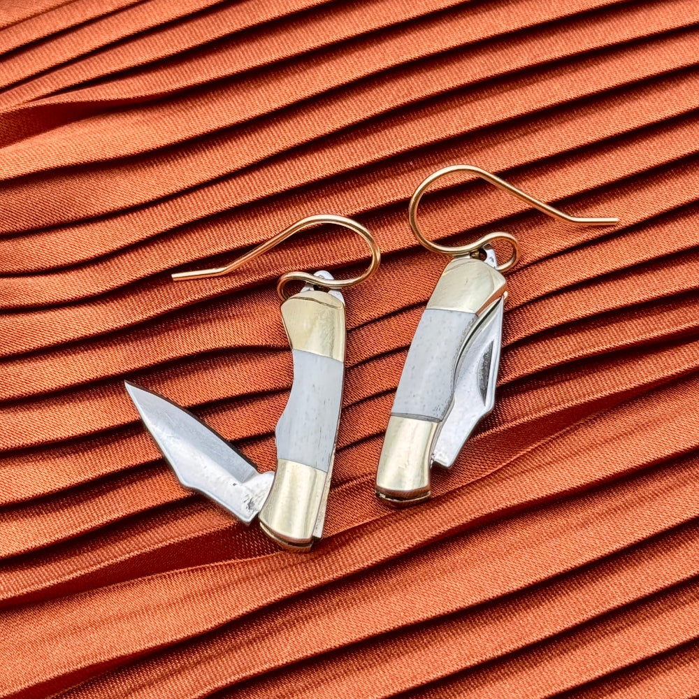 Two miniature bone inlay pocketknives hanging from gold or sterling silver ear wires