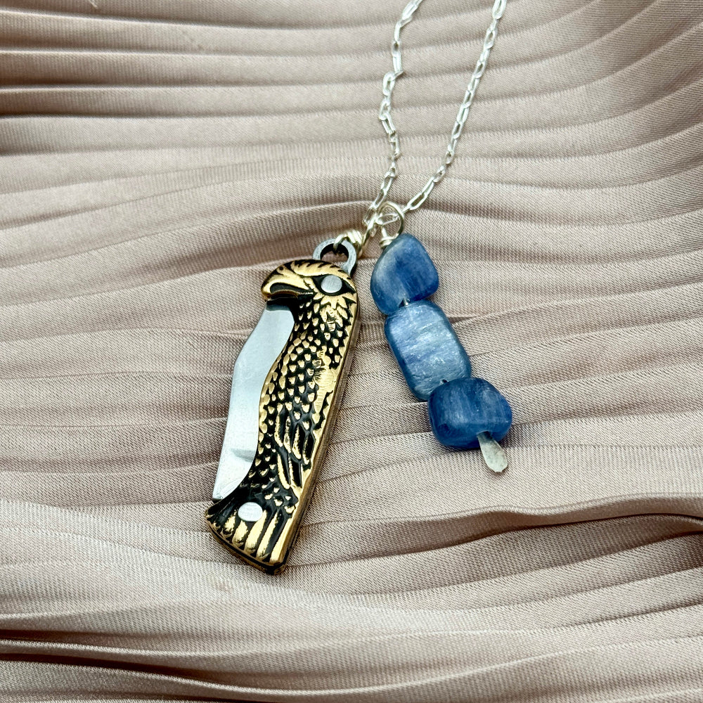 Talon bird shaped pocket knife necklace blade closed and kyanite beads