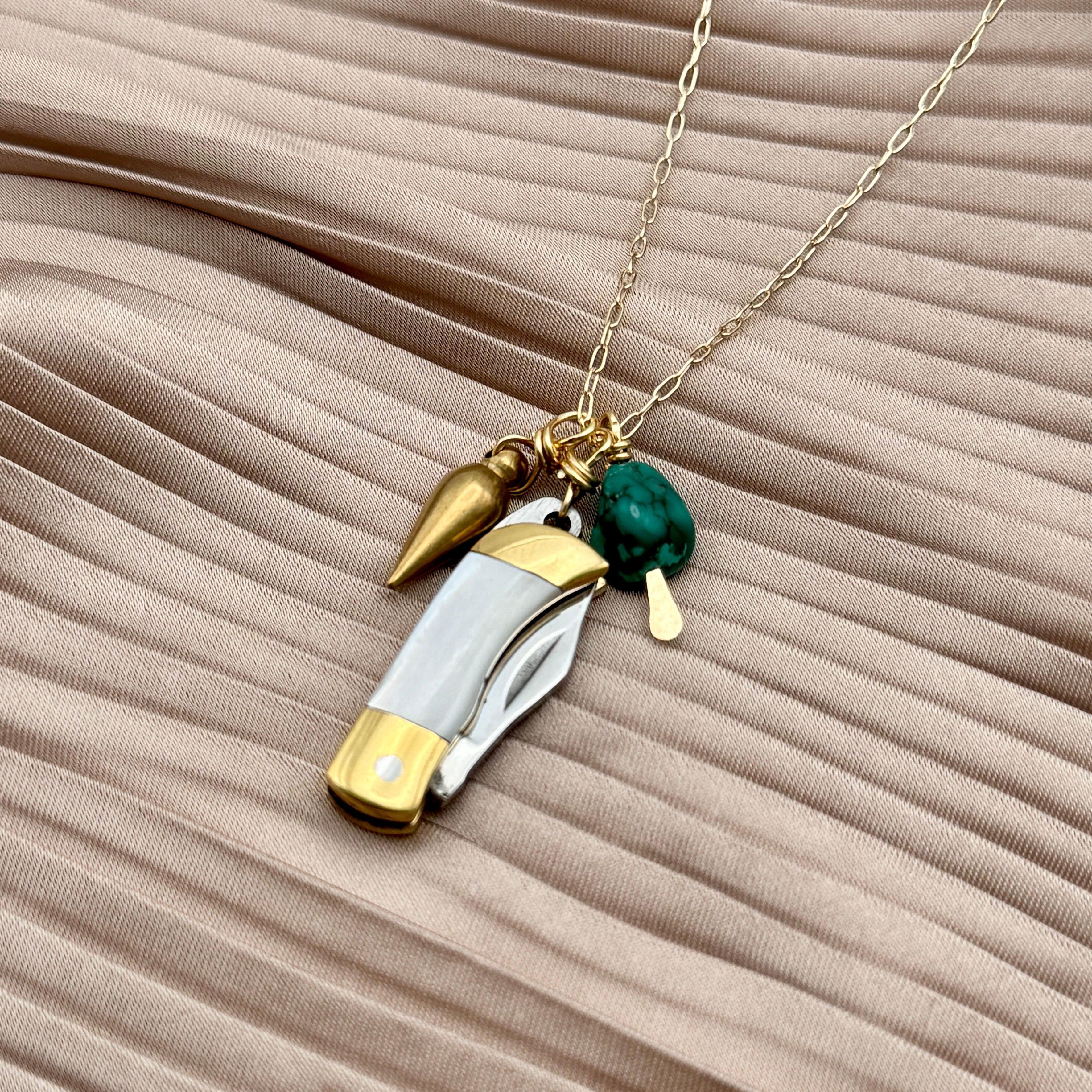 Miniature Pocketknife with mother of pearl inlay and a turquoise stone and mini bullet hanging from sterling silver or gold chain