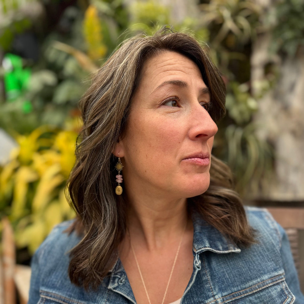 Starburst pendant over three rose quartz bead over a mini vintage inspired etched working locket on an ear wire