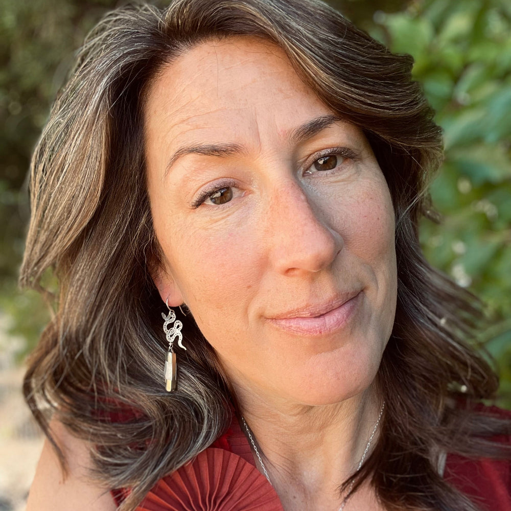 silver snake pendant with bone inlay mini pocketknife hanging from sterling silver ear wire