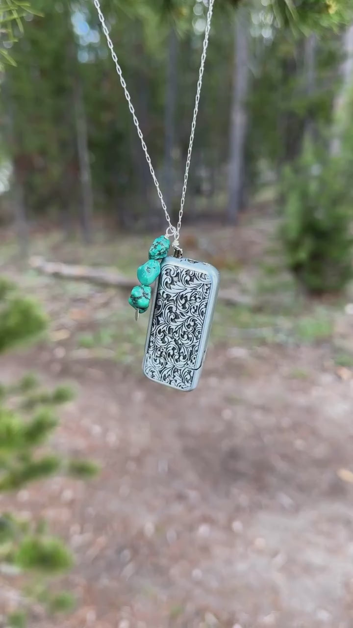 Silver engraved lighter with turquoise stones on a necklace chain